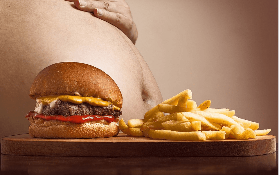 an obese man with high appetite